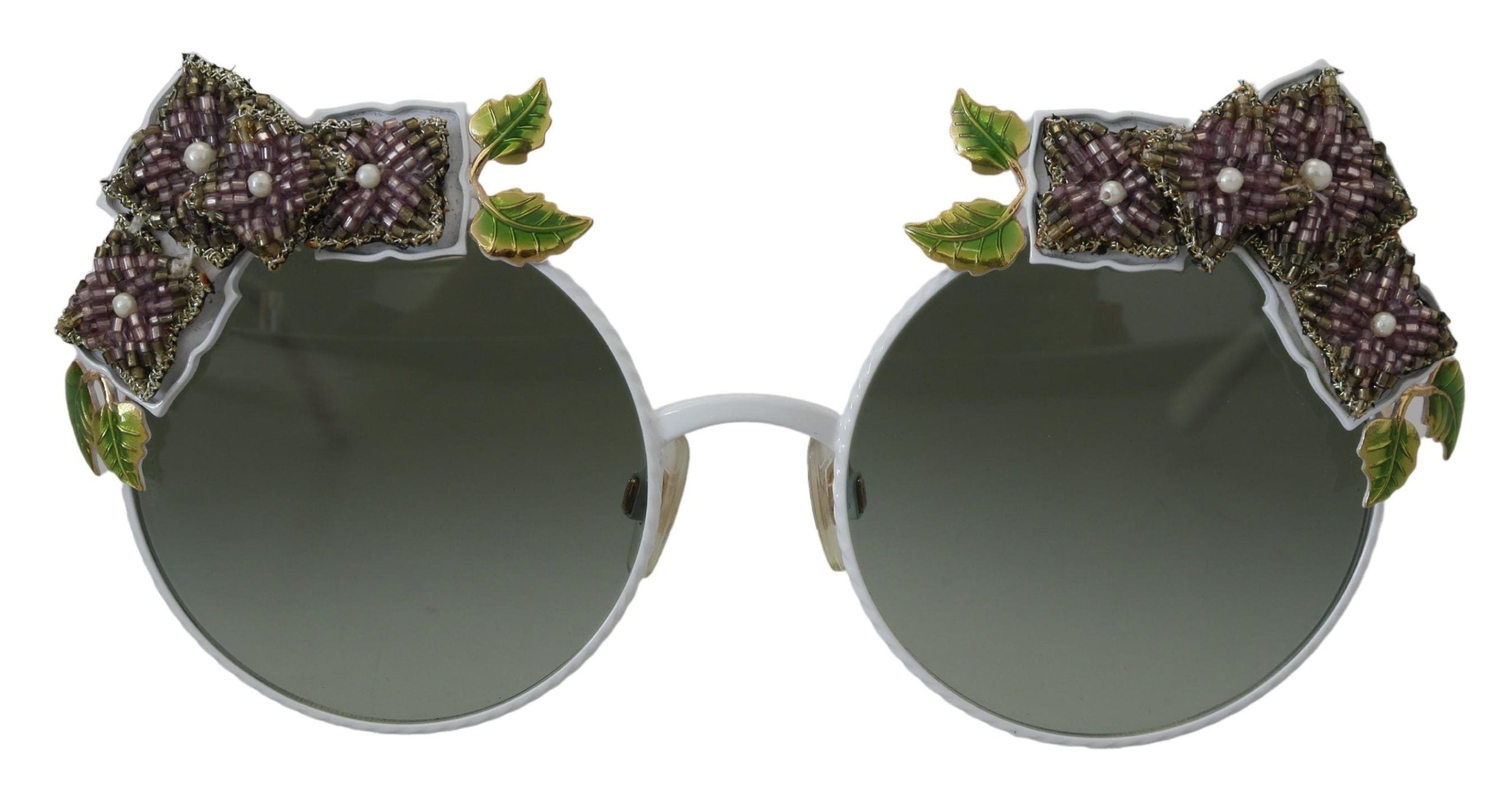 Elegante goldene Sonnenbrille mit Blumenverzierung