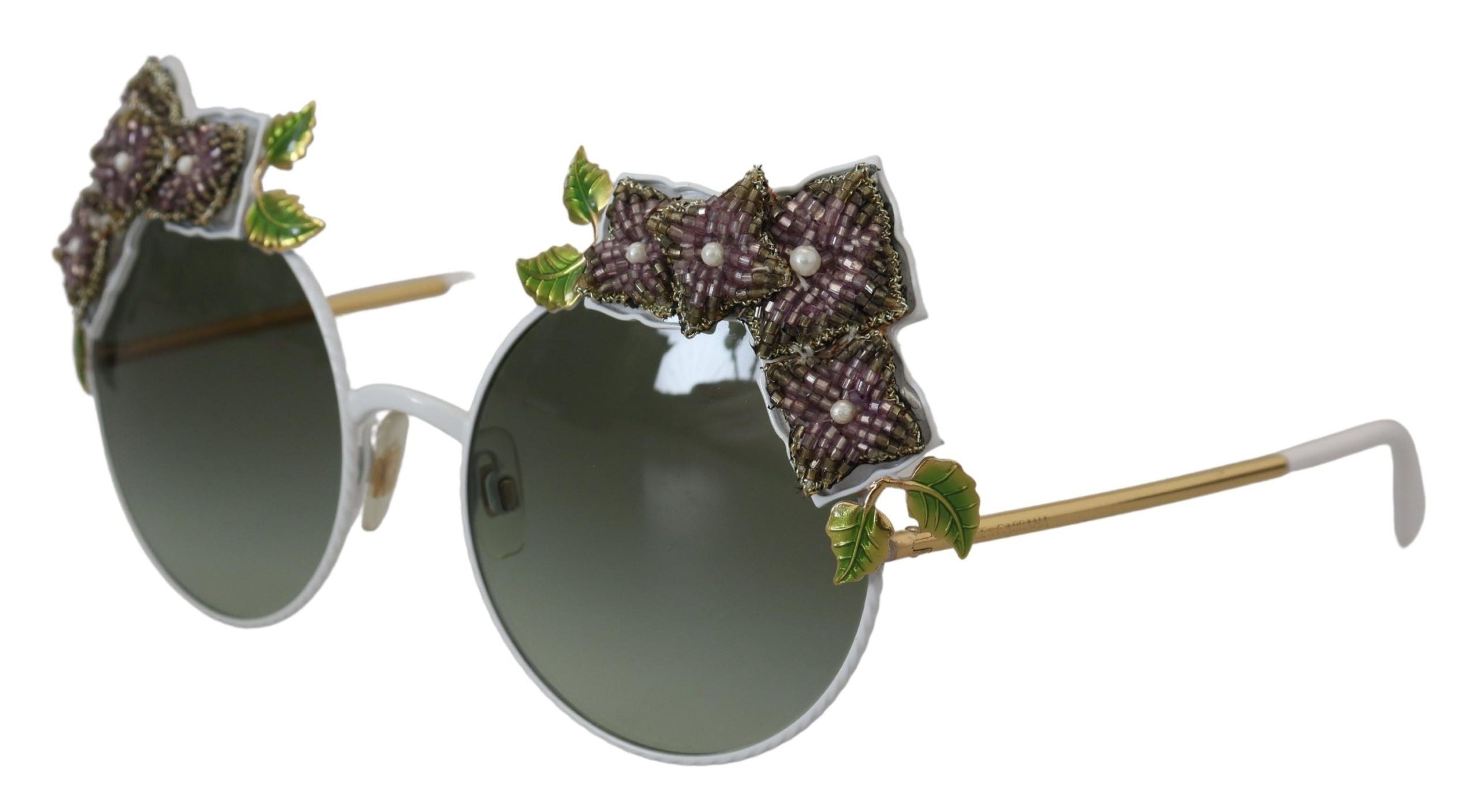 Elegante goldene Sonnenbrille mit Blumenverzierung